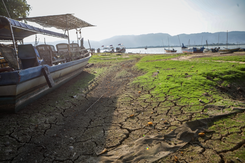 An area at the Timah Tasoh Dam tourist site appears dry following a prolonged heatwave in Padang Besar on March 24, 2026. — Bernama pic