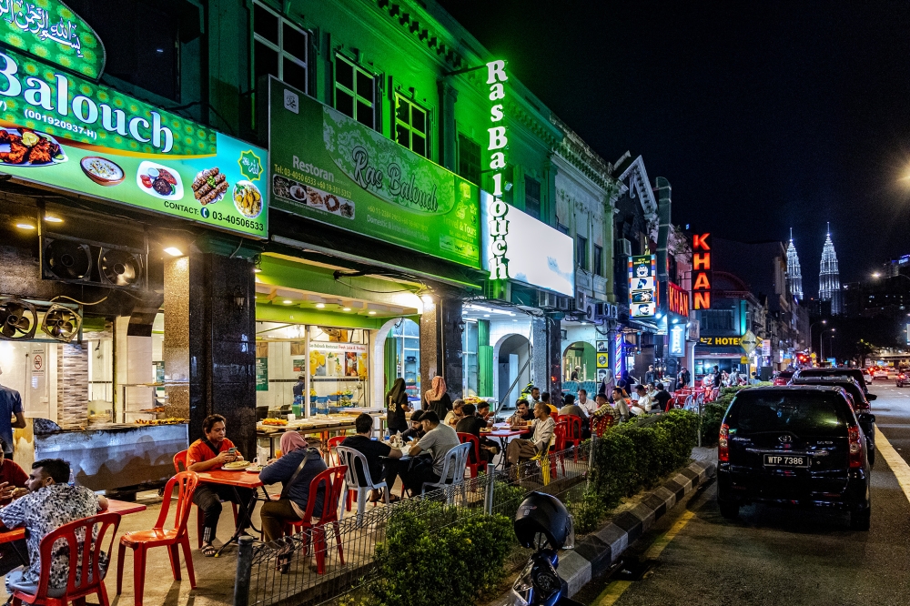 Locals and members of the Pakistani community alike enjoy dining and socialising in what is affectionately known as Little Pakistan. — Picture by Firdaus Latiff