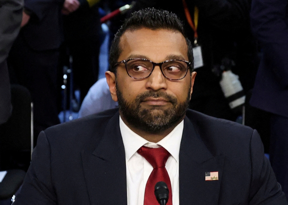 Kash Patel, U.S. President Donald Trump's nominee to be director of the FBI, looks on as he testifies before a Senate Judiciary Committee confirmation hearing on Capitol Hill in Washington, U.S., January 30, 2025. 