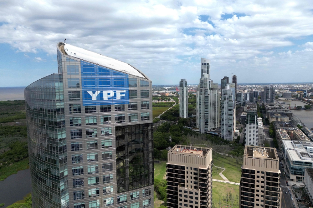 The logo of the Argentine national oil company YPF is seen on the company's headquarters in Buenos Aires on July 28, 2023. A US appeals court yesterday overturned a US$16.1 billion (RM63.1 billion) judgment against Argentina for nationalising the oil company YPF in 2012. — AFP pic 