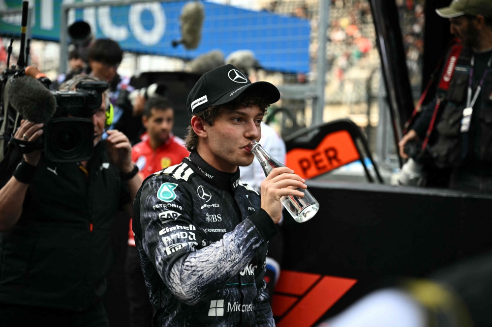 Mercedes' Italian driver Kimi Antonelli drinks water after taking the pole in the qualifying session ahead of the Formula One Japanese Grand Prix at the Suzuka circuit in Suzuka, Mie prefecture on March 28, 2026. — AFP pic 