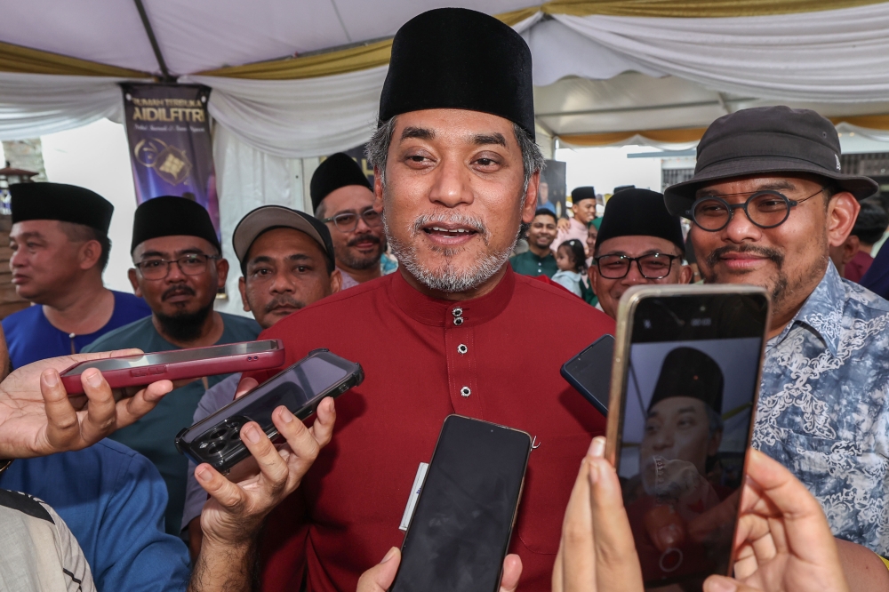 Former Umno Youth chief Khairy Jamaluddin speaks to reporters after attending Datuk Mohd Sumali Reduan’s open house in Benut, Pontian on March 28, 2026. — Bernama pic