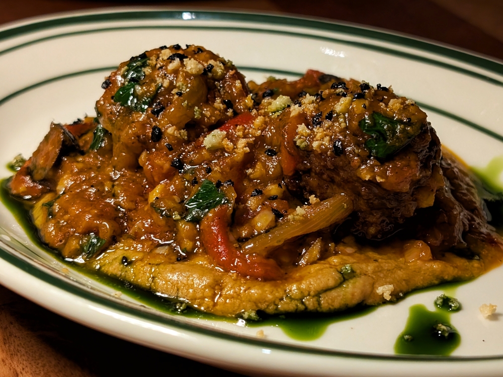 Lamb meatballs with smoked ricotta and hummus. — Picture by Ethan Lau