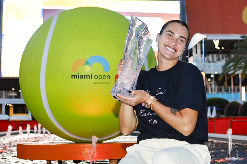 Belarusian Aryna Sabalenka poses with the Butch Buchholz trophy after defeating Coco Gauff of the United States during the Women’s Singles Final at the Hard Rock Stadium on March 28, 2026 in Miami Gardens, Florida. — AFP pic