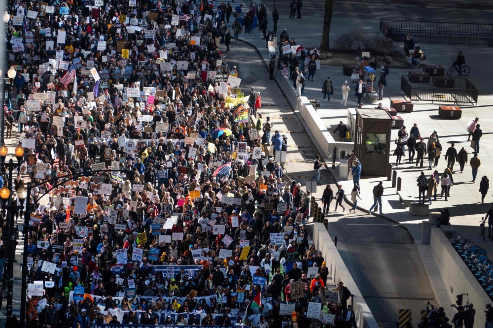 Thousands of demonstrators march through downtown Chicago to protest policies of the Trump administration, during a ‘No Kings’ march on March 28, 2026. — Getty Images via AFP