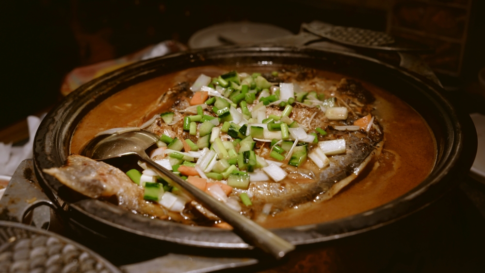 The restaurant reportedly said the fish was a rare wild river species, with pricing based on weight and no additional or hidden charges. — Unsplash pic