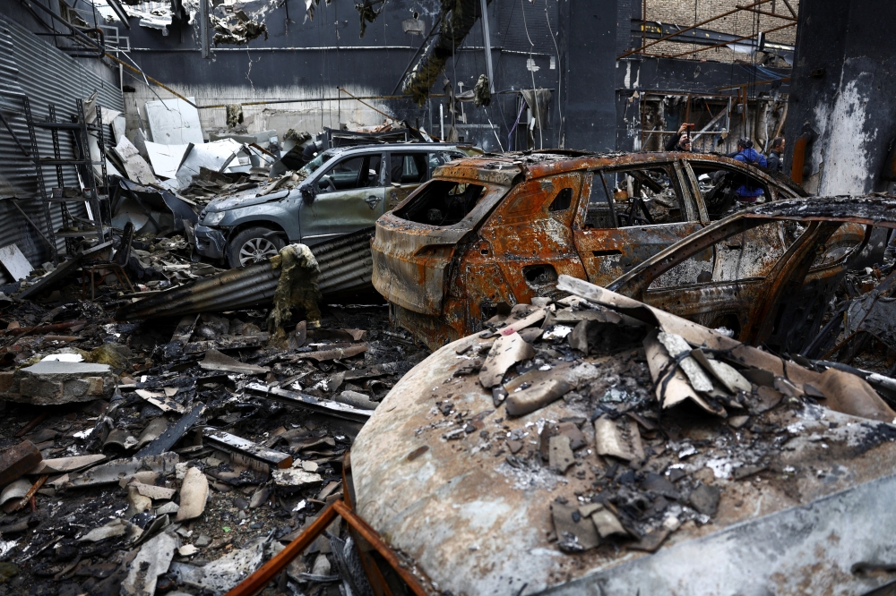 A view of a car repair shop and dealership damaged by a strike, amid the US-Israeli conflict with Iran, in Tehran March 28, 2026. — Majid Asgaripour/Wana (West Asia News Agency) pic via Reuters
