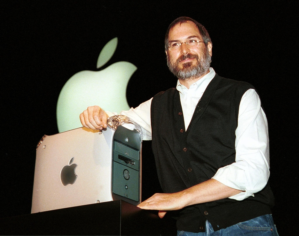 This file picture shows Steve Jobs introducing the Power Mac G4 computer during his keynote address at Seybold in San Francisco, on August 31, 1999. — AFP pic