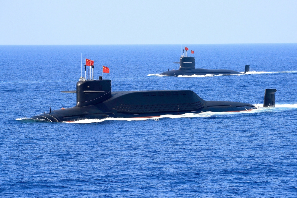 A nuclear-powered Type 094A Jin-class ballistic missile submarine of the Chinese People's Liberation Army (PLA) Navy in waters during a military display in the South China Sea April 12, 2018. — Reuters/Stringer pic  