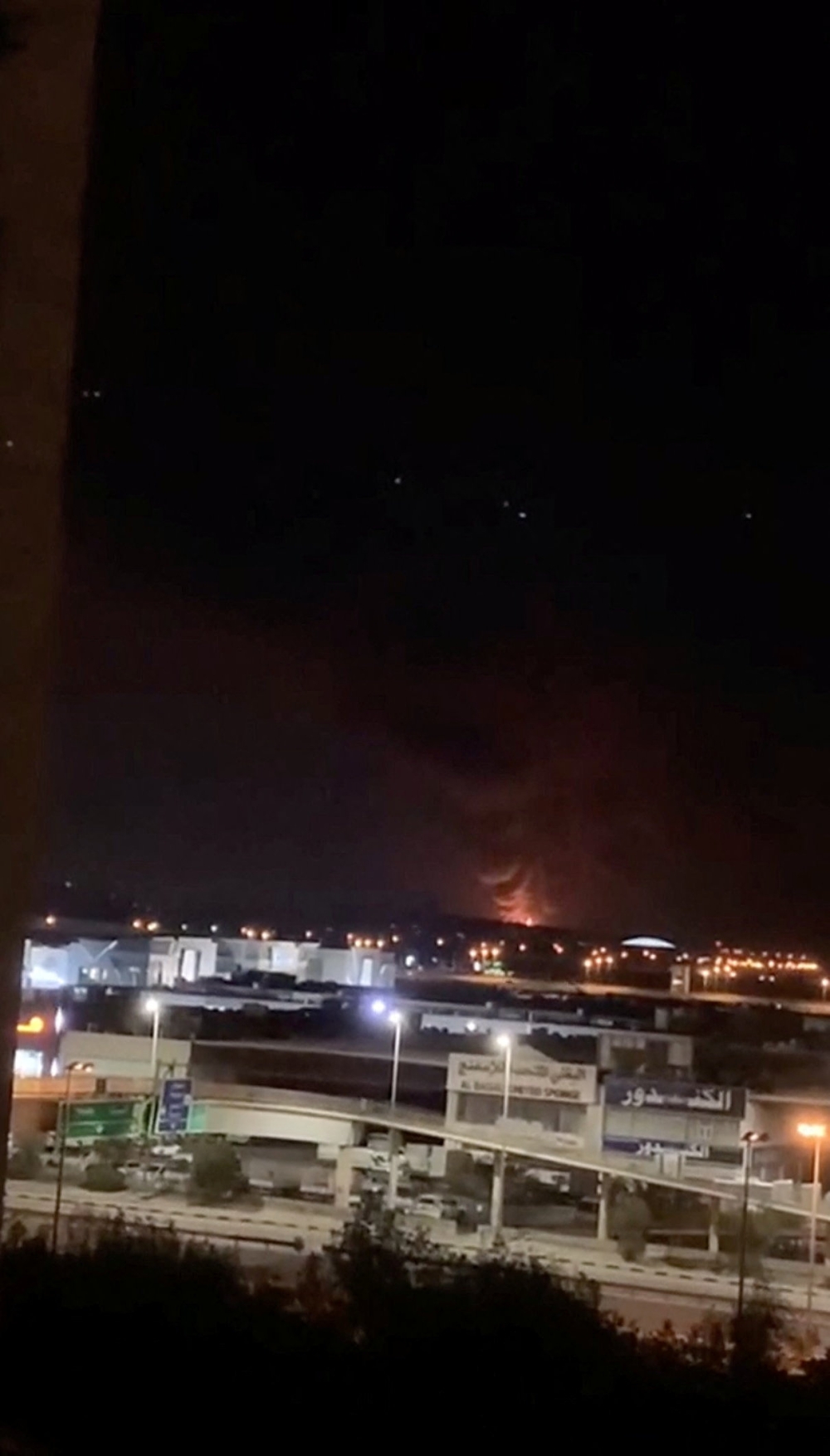 Smoke and fire rise in the direction of the fuel tank at Kuwait International Airport, following a drone strike amid the US-Israeli conflict with Iran, in Al-Dajeej, Kuwait, March 25, 2026, in this still image obtained from a social media video. — Social media pic via Reuters 