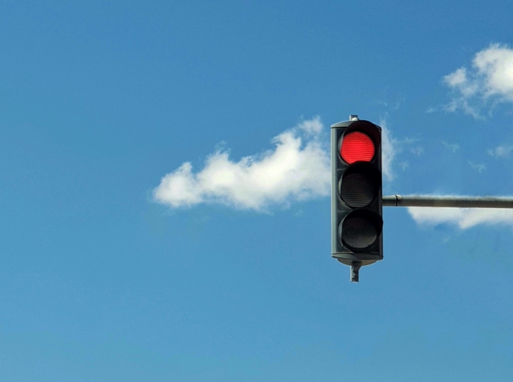 Selangor JPJ director, Azrin Borhan, said running red lights and using mobile phones while driving were the most frequently committed offences by road users during the operation. — Pexels.com pic