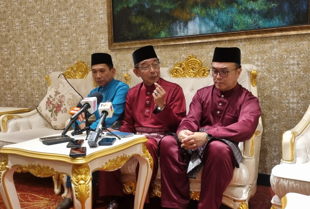 Sarawak Minister of Tourism, Creative Industry and Performing Arts Datuk Seri Abdul Karim Rahman Hamzah (centre), who is also Minister of Youth, Sports and Entrepreneur Development, said any move to alter the definition of Bumiputera or native status in Sarawak must follow proper legal and constitutional process, noting that clear provisions are already in place. — The Borneo Post pic 