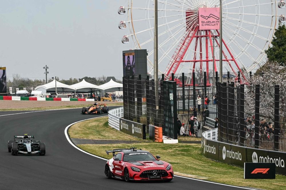 The safety car leads drivers following a crash by Haas F1 Team's British driver Oliver Bearman during the Formula One Japanese Grand Prix at the Suzuka circuit in Suzuka, Mie prefecture on March 29, 2026. — AFP pic 