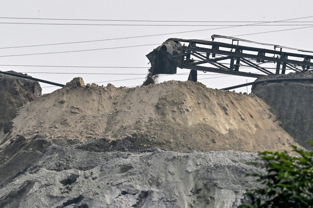 This photo taken on March 19, 2026, shows waste slag inside the the Duc Giang Lao Cai chemical plant in the Tang Loong industrial Park, Lao Cai Province, northern Vietnam. Grey and white smoke around the clock, dust-covered trees and nonstop noise: residents living next to Vietnam's biggest chemical production complex coexist with toxic fumes from the factories. — AFP pic