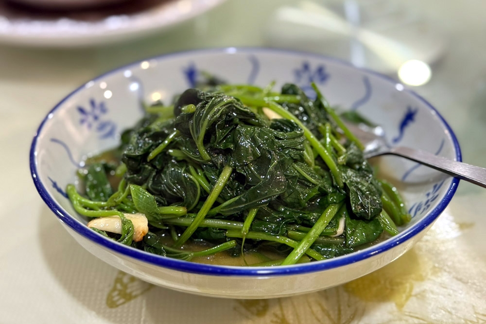 Stir-fried sweet potato leaves. — Picture by CK Lim