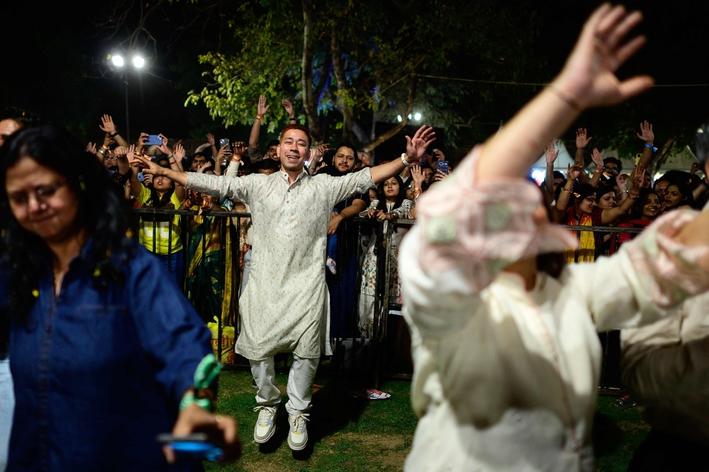 Revellers enjoy Hindu spiritual songs called 'Bhajans' during the Sanatan Journey devotional music festival at the iconic Purana Qila in New Delhi on March 1, 2026. — AFP pic