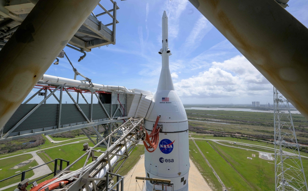 Nasa’s Artemis II Space Launch System (SLS) rocket and Orion spacecraft stand atop a mobile launcher at Launch Complex 39B, Kennedy Space Center, Florida, March 30, 2026, as the agency begins its countdown to a planned April 1 crewed lunar mission. — Nasa handout pic via AFP 