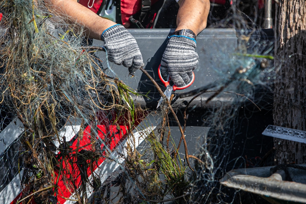 Tasik Temenggor’s tranquillity is increasingly threatened by pollution from abandoned fishing nets, risking disruption to the ecosystem of the 117,500-hectare lake, Gerik, March 31, 2026. — Bernama pic