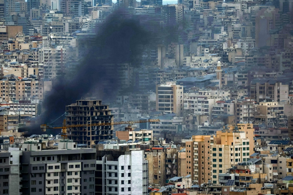 Smoke rises from the site of an Israeli airstrike on Beirut’s southern suburbs on March 30, 2026. — AFP pic