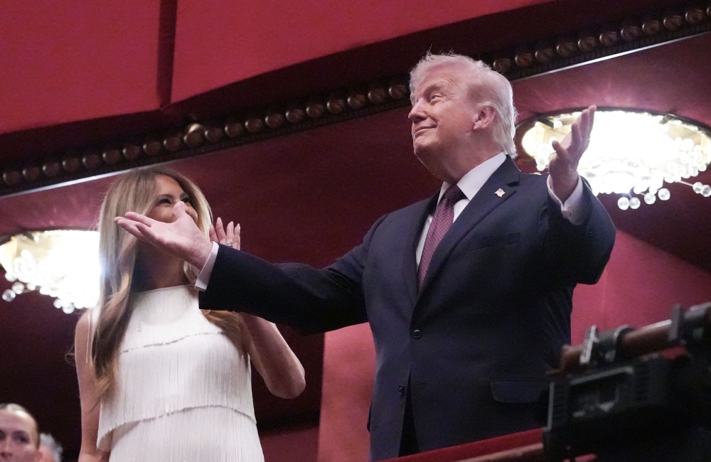 US President Donald Trump and US First Lady Melania Trump attend the opening night of ‘Chicago’ at the Kennedy Center in Washington, DC, on March 31, 2026. — AFP pic