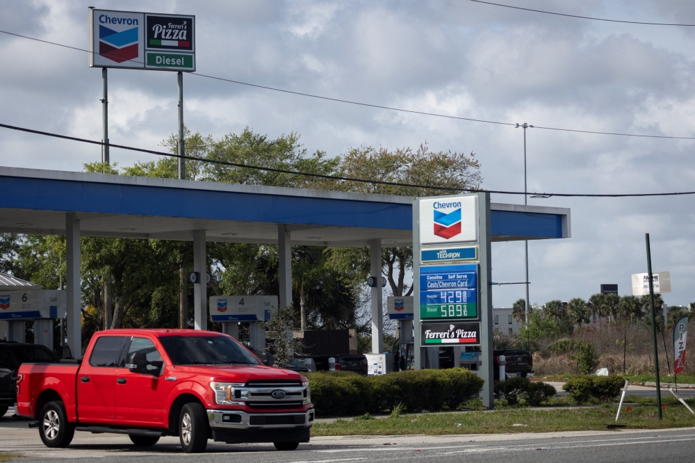 Gas prices are displayed at a gas station as the prices of oil and gas surge, amid the US-Israel conflict with Iran, in Titusville, Florida, US, March 31, 2026. — Reuters pic