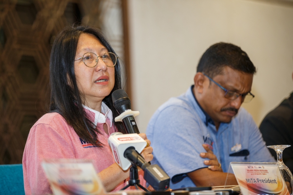 Mita president Mint Leong and vice-president (transport) Logeswaran K. Sukumar when announcing the new maximum price guide on March 30, 2026. — Picture by Raymond Manuel