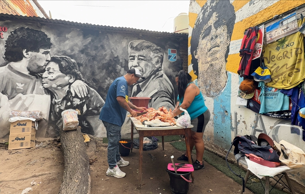 Where Maradona once lived, the hungry now gather