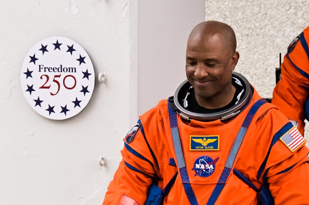 Nasa astronaut Victor Glover reacts before boarding the astronaut van with at the Kennedy Space Center in Cape Canaveral, Florida, April 1, 2026. — Reuters pic