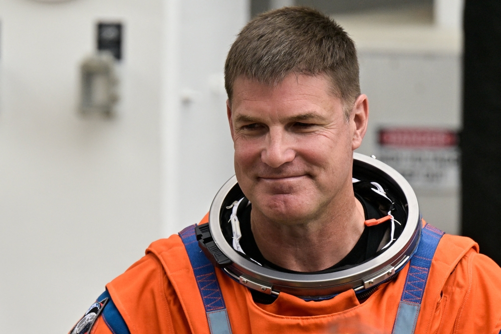 Canadian Space Agency astronaut Jeremy Hansen reacts alongside Artemis II crew members Reid Wiseman, Victor Glover and Christina Koch before departing for Launch Pad 39B at the Kennedy Space Center in Cape Canaveral, Florida, April 1, 2026.
