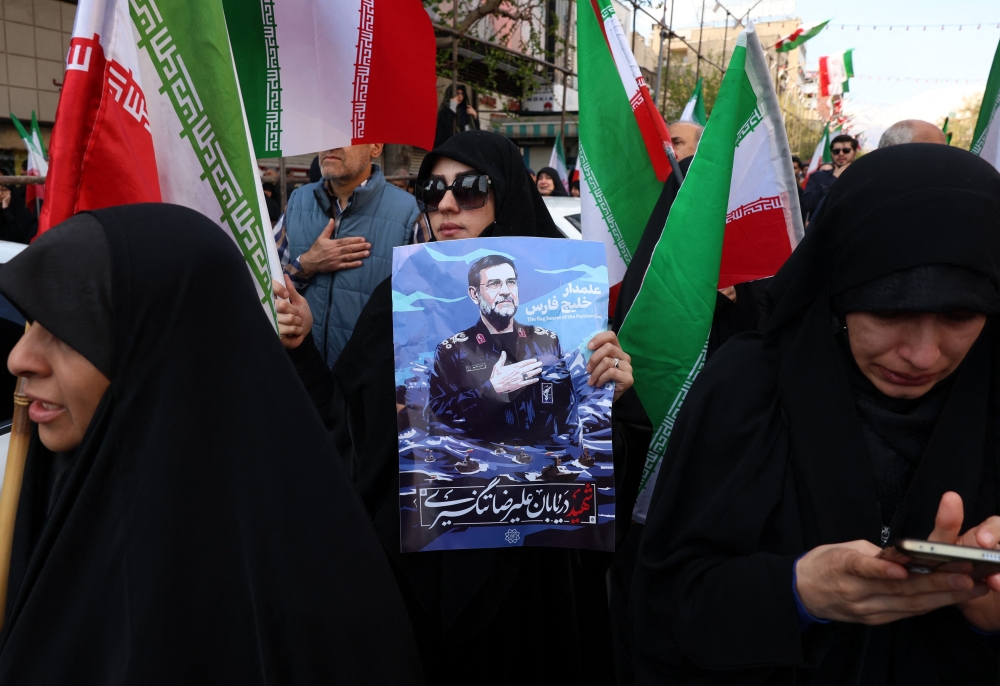 Iranians vow to ‘resist until the end’ at Guards naval chief’s funeral