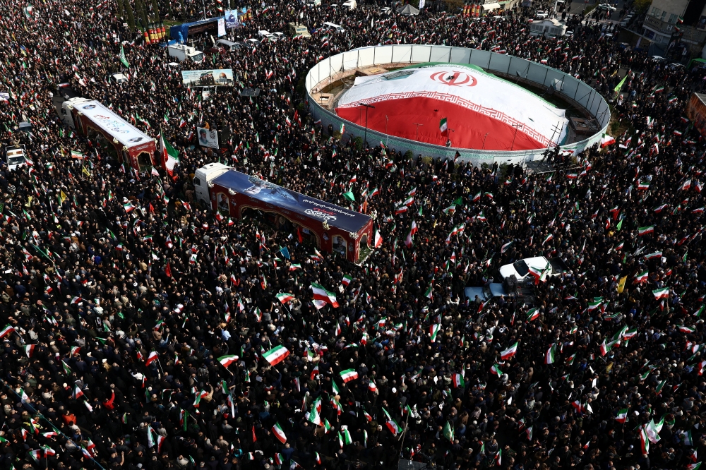 People attend a funeral ceremony for the Revolutionary Guards Navy Commander Alireza Tangsiri, who was killed in strikes, amid the US-Israeli conflict with Iran, in Tehran, Iran, April 1, 2026. — Majid Asgaripour/Wana (West Asia News Agency) pic via Reuters