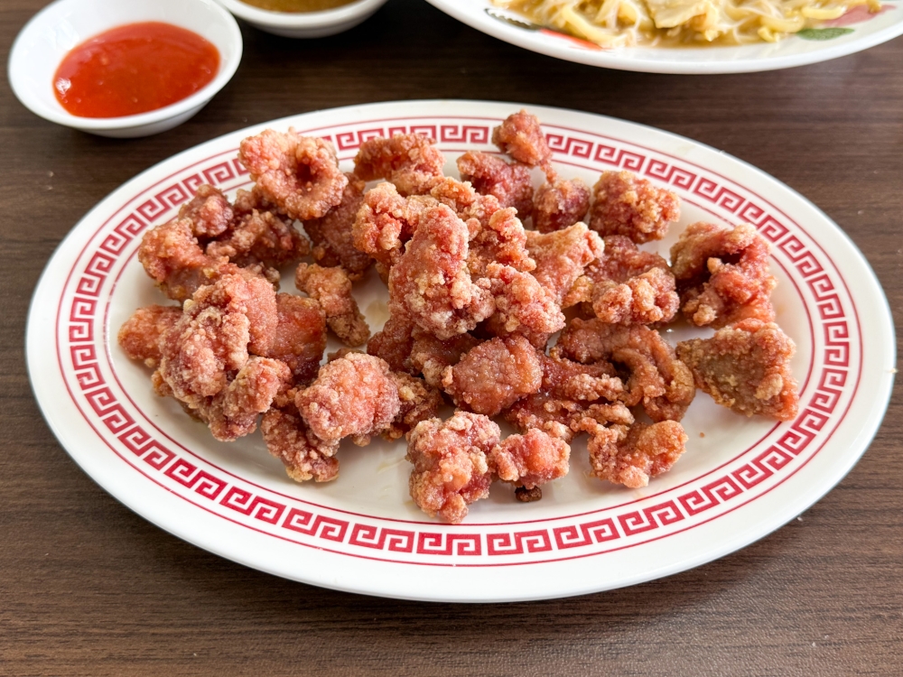 Nibble on Crispy Fried Pork as a side dish with your noodles. — Picture by Lee Khang Yi
