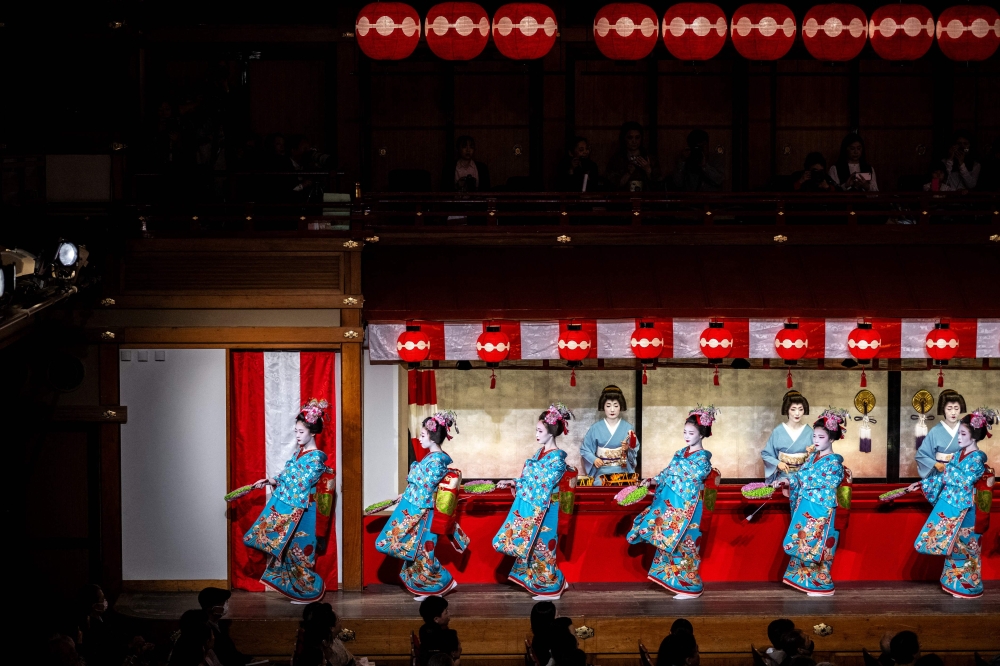 Geisha and maiko (apprentice geisha) take part in a rehearsal for the annual ‘Miyako Odori’ in Kyoto March 31, 2026. — AFP pic