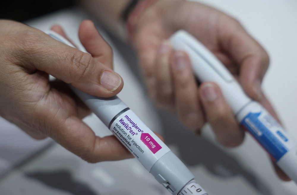 Dr Swati Pradhan displays a Mounjaro injection used for weight loss procedures at a clinic in Mumbai March 31, 2026. — Reuters pic