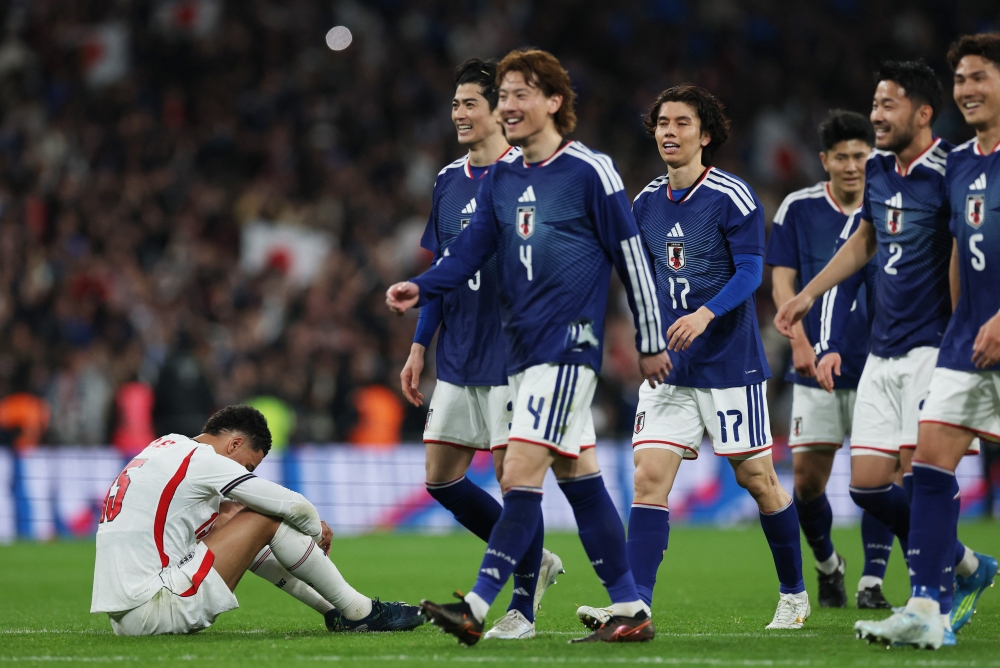 Japan flex World Cup muscle while Asia rivals stumble in mixed international window