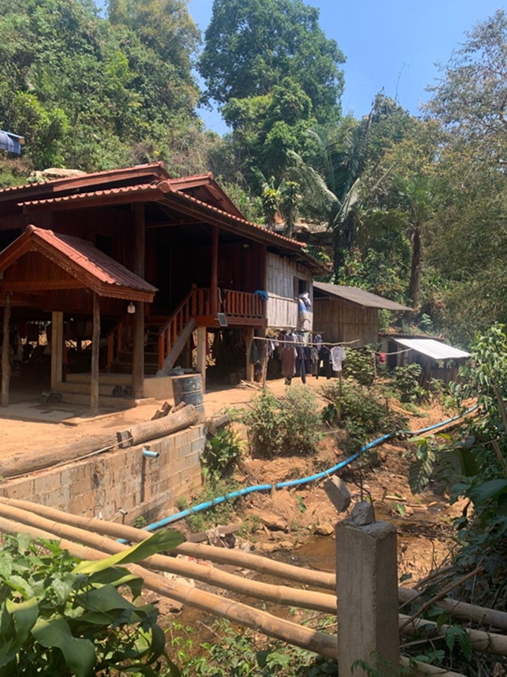 A small Kayin village of just 23 houses sits quietly along the hillside, where wooden homes, shared spaces, and everyday routines reflect a tightly woven community. The scale of the village speaks to both intimacy and vulnerability, a place where identity is maintained collectively, and where smallness becomes a form of resilience in Thailand’s northern highlands. — Picture courtesy of Khoo Ying Hooi