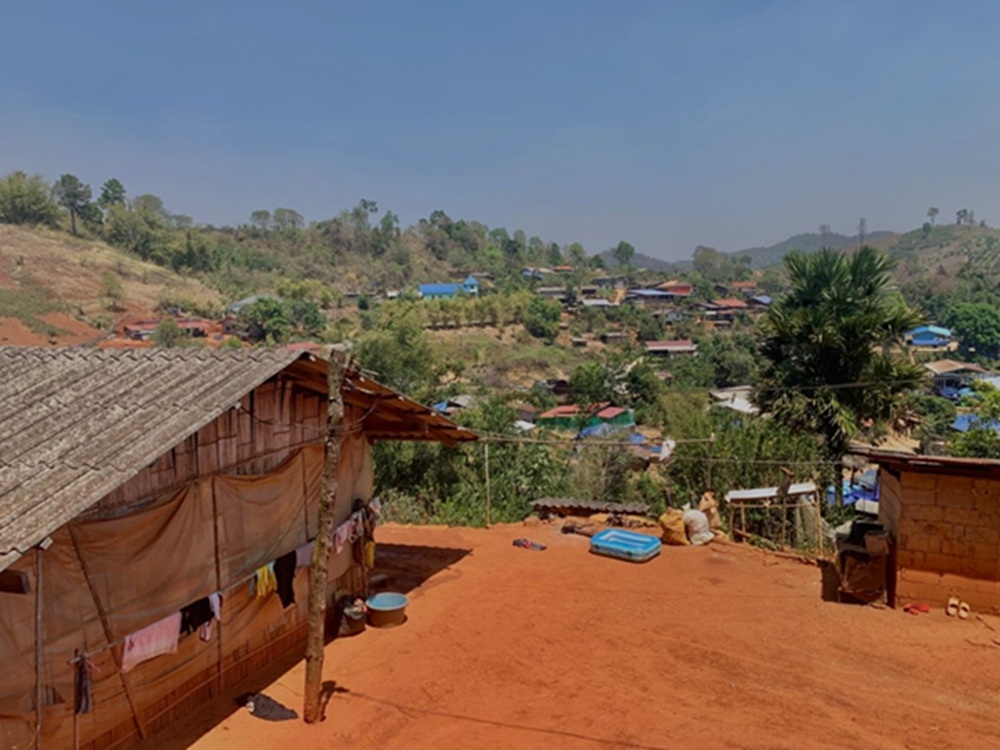 Photo 1 – Lisu Ceremonial GroundA quiet Lahu settlement stretches across the hills, where wooden houses overlook a landscape shaped by distance and rhythm. The calmness reflects a community grounded in language, kinship, and everyday agricultural life. — Picture courtesy of Khoo Ying Hooi
