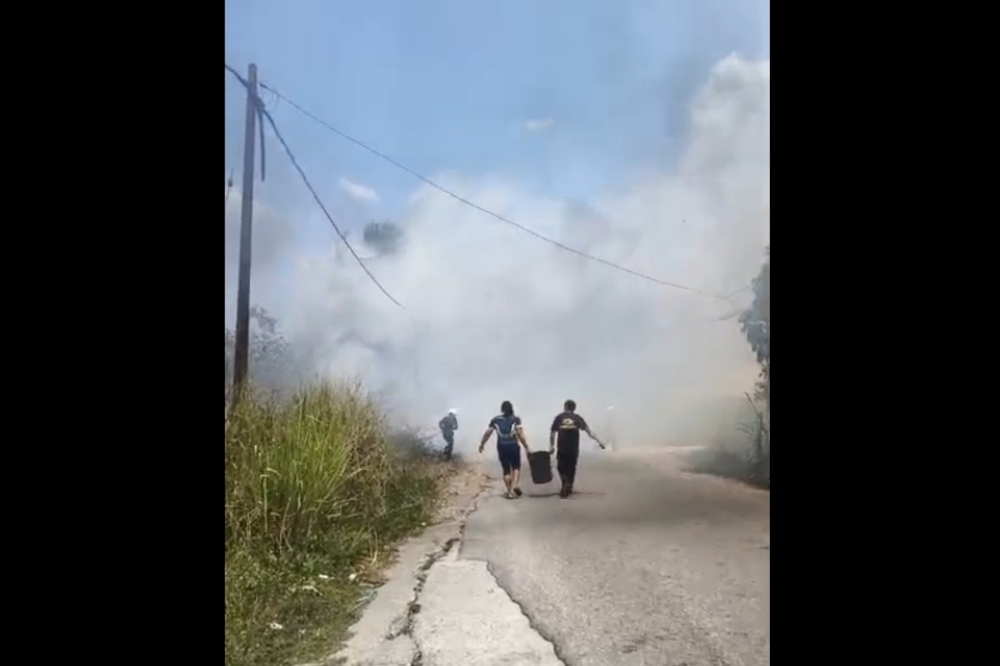 Hot, dry weather fuels three Pasir Mas bushfires, swiftly contained by fire crews