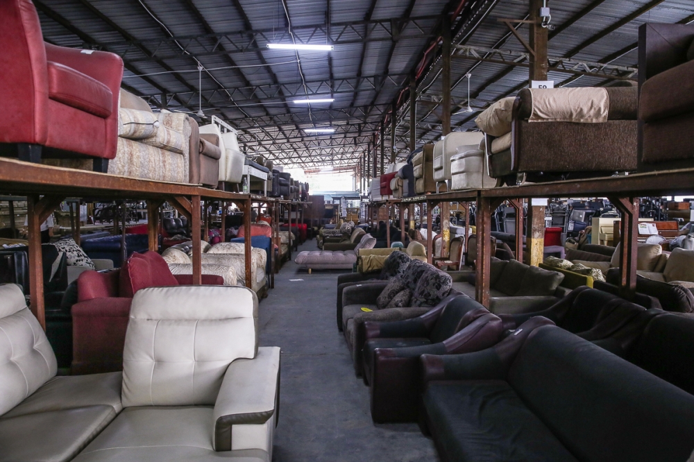 File picture of furniture displayed at the Unearth warehouse at Kampung Baru Subang in Shah Alam, October 5, 2022. What big ticket item would you postpone buying now? Could it be new furniture, electrical appliances such as a television or refrigerator, or a car? — Picture by Yusof Mat Isa 