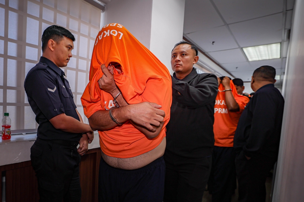 Four individuals, including two lecturers from a northern private higher education institution, have been remanded for four days over an alleged RM5 million bribery case in Ipoh April 8, 2026. — Bernama pic