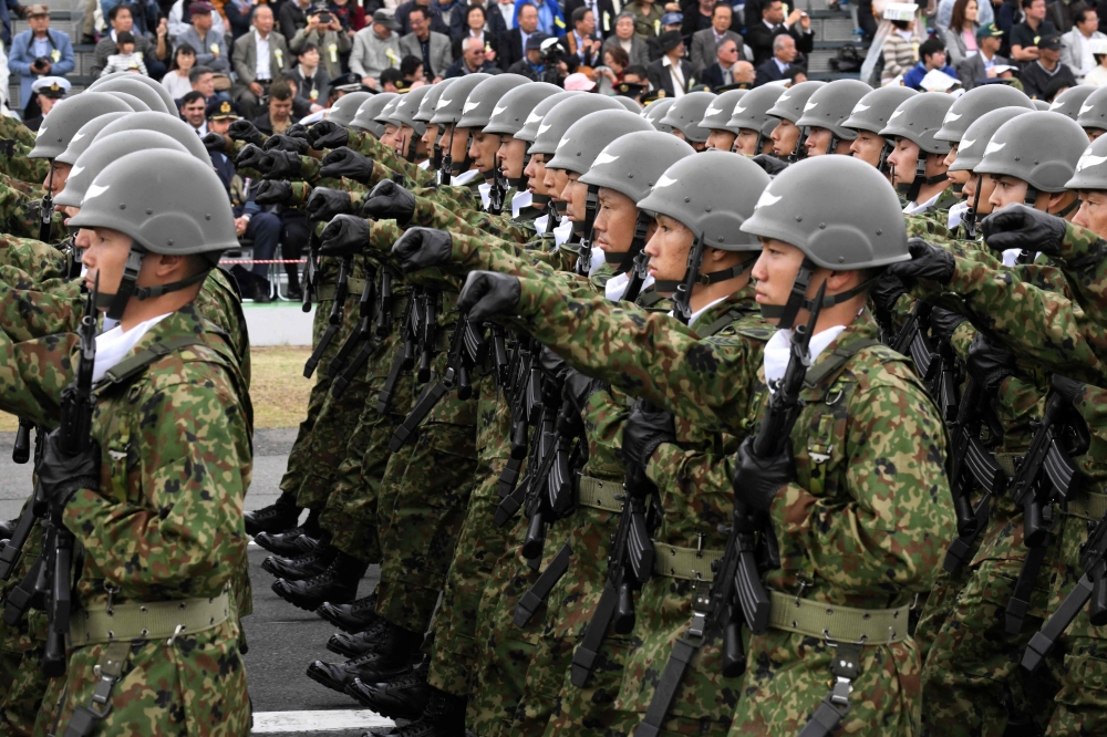 Japan short on recruits, eyes women to fill ranks by 2036