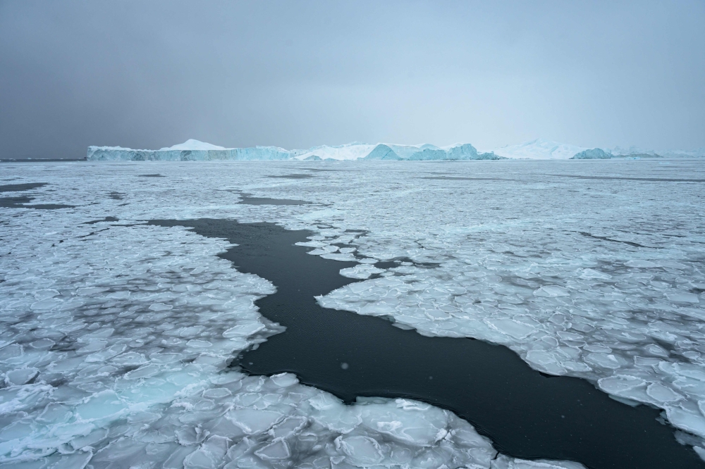 This photograph shows sea ice forming around icebergs in Disko Bay, not far from Ilulissat, Greenland, on March 15, 2026. — AFP pic 