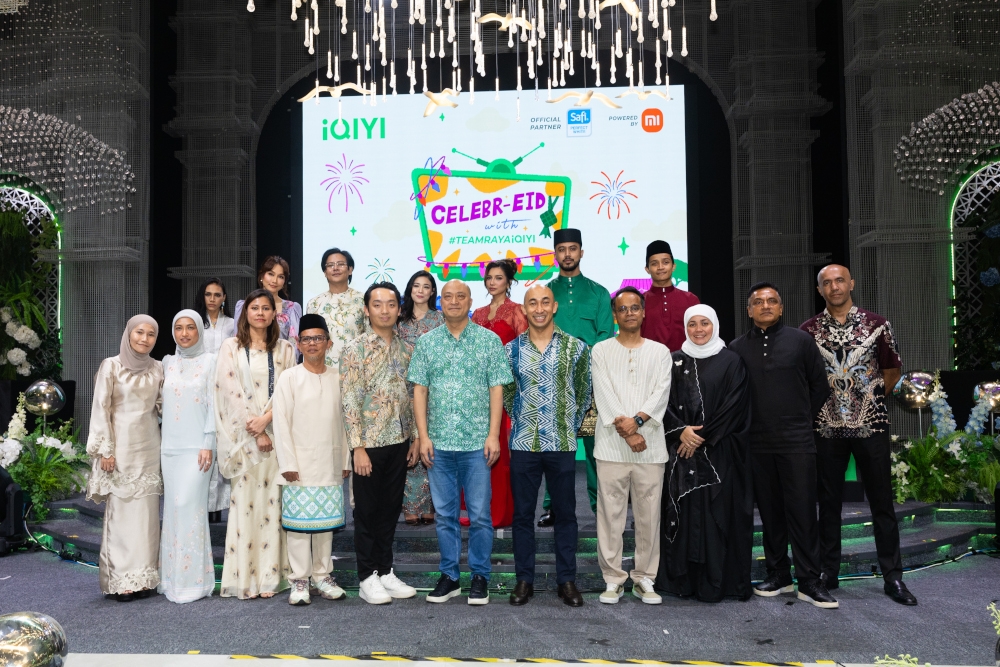 The iQIYI team, including the cast and directors of upcoming local titles, pose for a photo at yesterday’s ‘Celebr-Eid with Team Raya iQIYI 2026’ event. — Picture courtesy of iQIYI