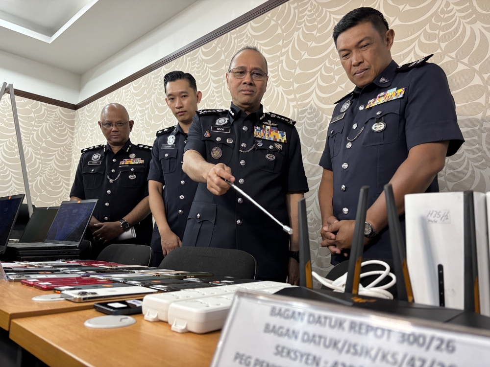 Perak police raid Bagan Datuk call centre, nab 22 Chinese nationals in Italian-targeted stablecoin scam