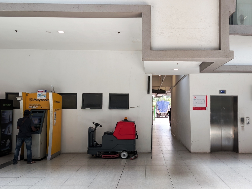 Can’t find the restaurant? Look for the lift or stairs next to the Maybank ATM on the ground floor. — Picture by Ethan Lau