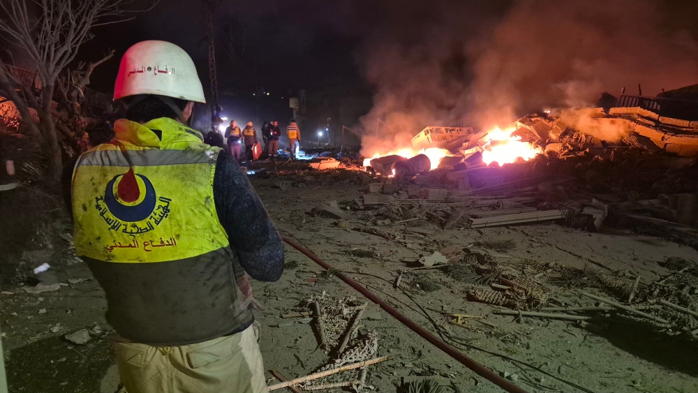 First responders gather at the site of an Israeli airstrike in the village of Habbouch, southern Lebanon on April 10, 2026. A ceasefire in name, conflict in reality – even after agreements are signed, fighting often continues, underscoring how fragile the first steps towards peace can be. — AFP pic
