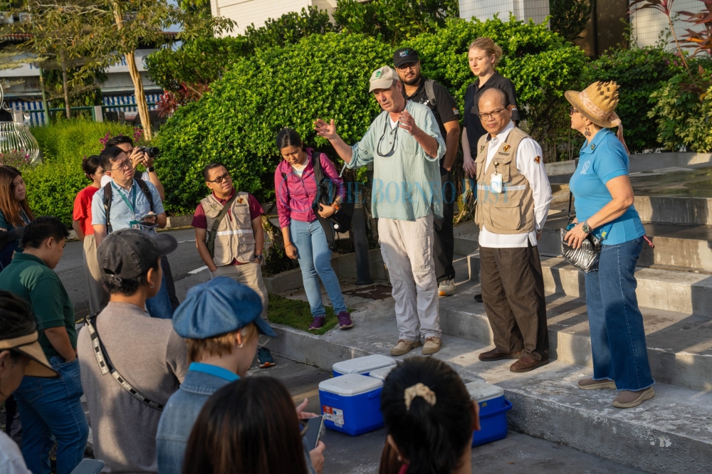 Dr Ad Vos delivers a briefing on the oral rabies vaccine (ORV) programme during the session. — Borneo Post pic