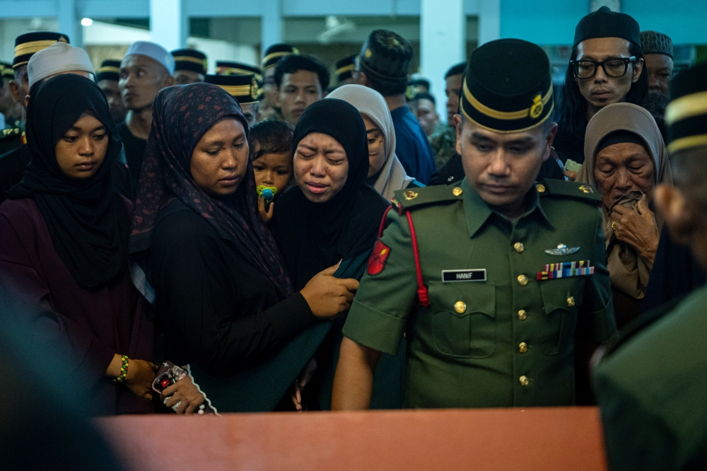 Family mourns army private who died after assault, father says he has ‘accepted it, but it is hard to bear’