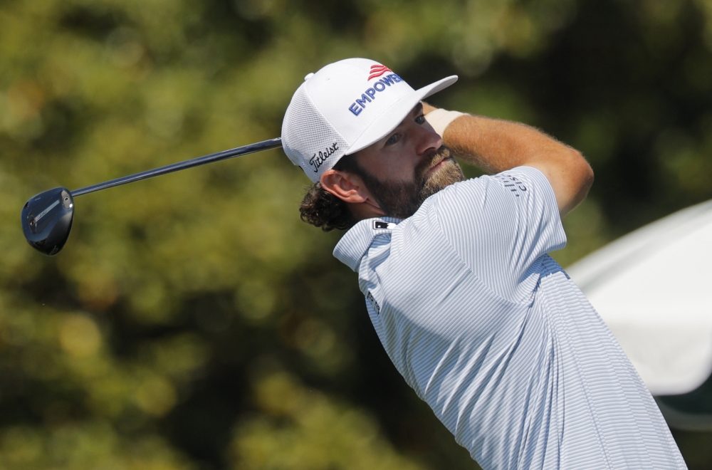 Cameron Young of the US watches his tee shot on the 10th hole during the third round of The Masters at Augusta National Golf Club, Augusta April 11, 2026. — Reuters pic 