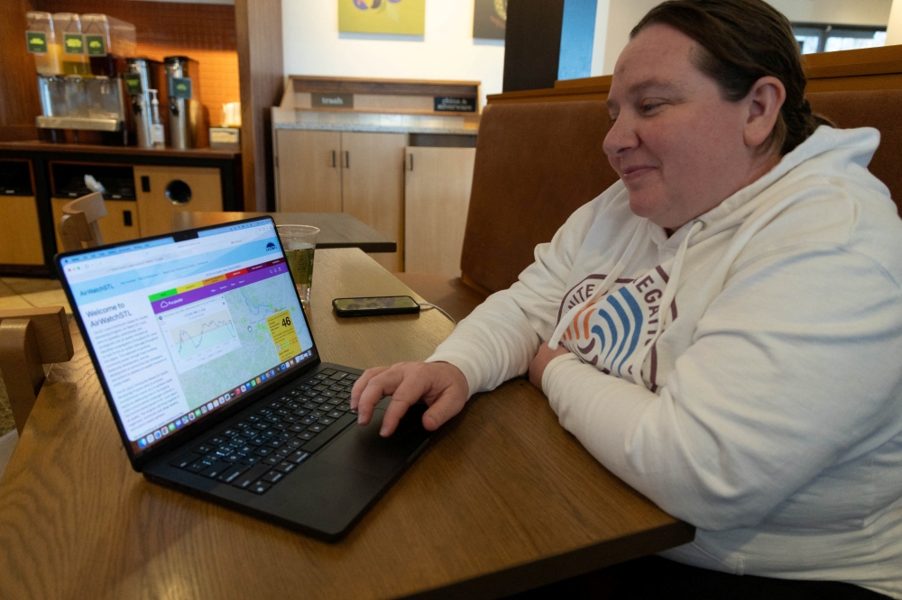 Beth Gutzler views air quality data on the AirWatchSTL website on a laptop in Florissant, Missouri, US, February 18, 2026. — Reuters pic